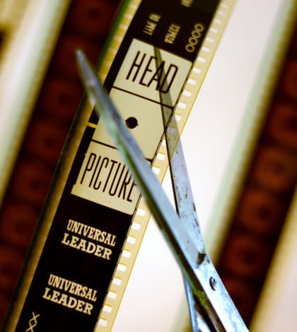 "Scissors cutting film. Film leader part. Backlit film, grungy scissors.View the complete series:"