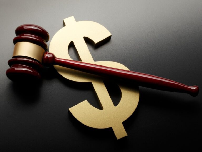 gavel and money symbol