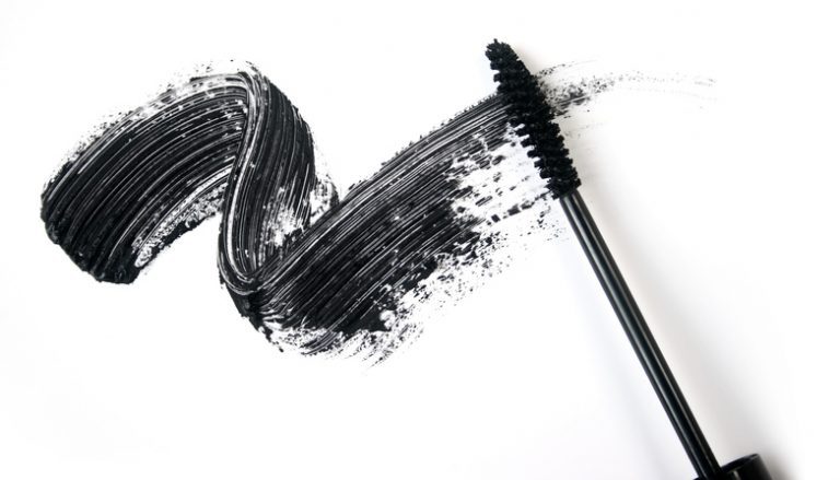 A smear of black eye liner from a mascara brush.