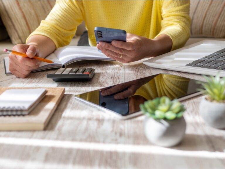 woman-setting-financial-goals-at-home Your Legal Department Budget: A Strategic Annualized Approach