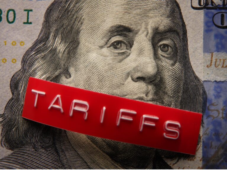 red-tariffs-label-on-a-hundred-dollar-bill