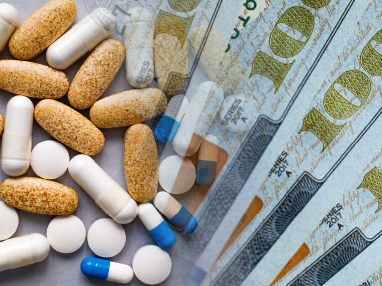 Pills and capsules on money, concept of increasing prices for medicine